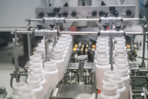 A photo of a plastic bill bottle production line.